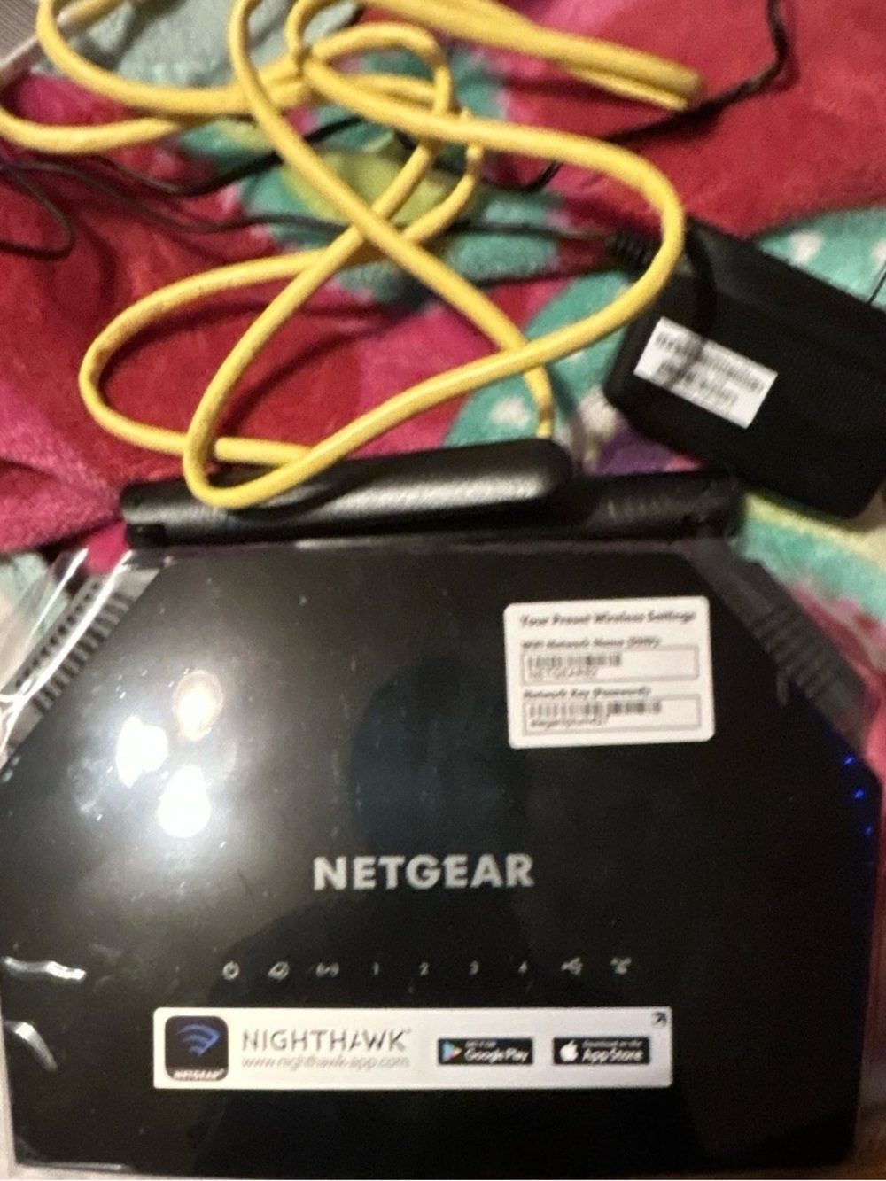 NETGEAR Black Nighthawk Wireless Router with Yellow Ethernet Cable